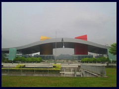 Shenzhen Civic Center or Citizen's Center is an enormous building complex, that is famous for its colourful exterior and curved roof. It opened in 2004 and was designed by John M. Y. Lee  and Michael Timchula and is one of the world's largest buildings and consists of two main halls, connected by a curved roof in the shape of a bird that can be passed underneath, after walking up through stairs. It houses the City Hall with 26 government agencies, as well as an exhibition center, a shopping mall, conference center and the interesting Shenzhen Museum. Around the complex you wil find a large park, Wongtee Plaza and Central Walk shopping malls, several large hotels, one of China's larges book stores, the Childrens Palace and the Shenzhen Library and Opera buildings. Concerts and performances are taking place in the area.